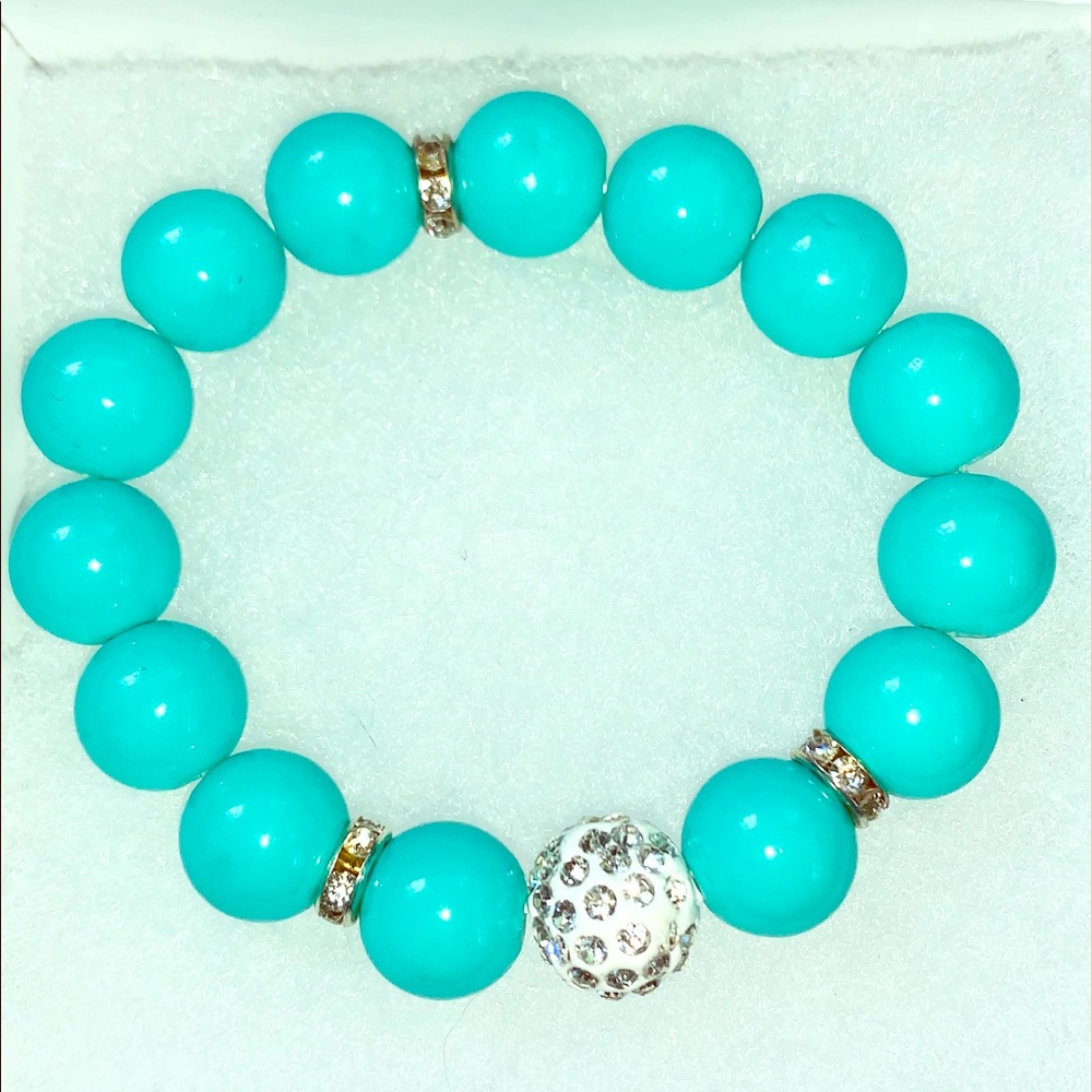 Set of 4 different style and color bead bracelets